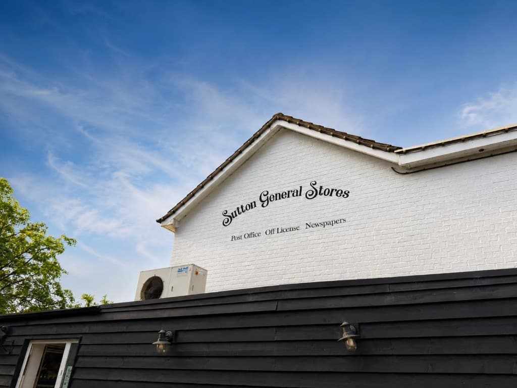 Sutton General Stores exterior with village shop signage